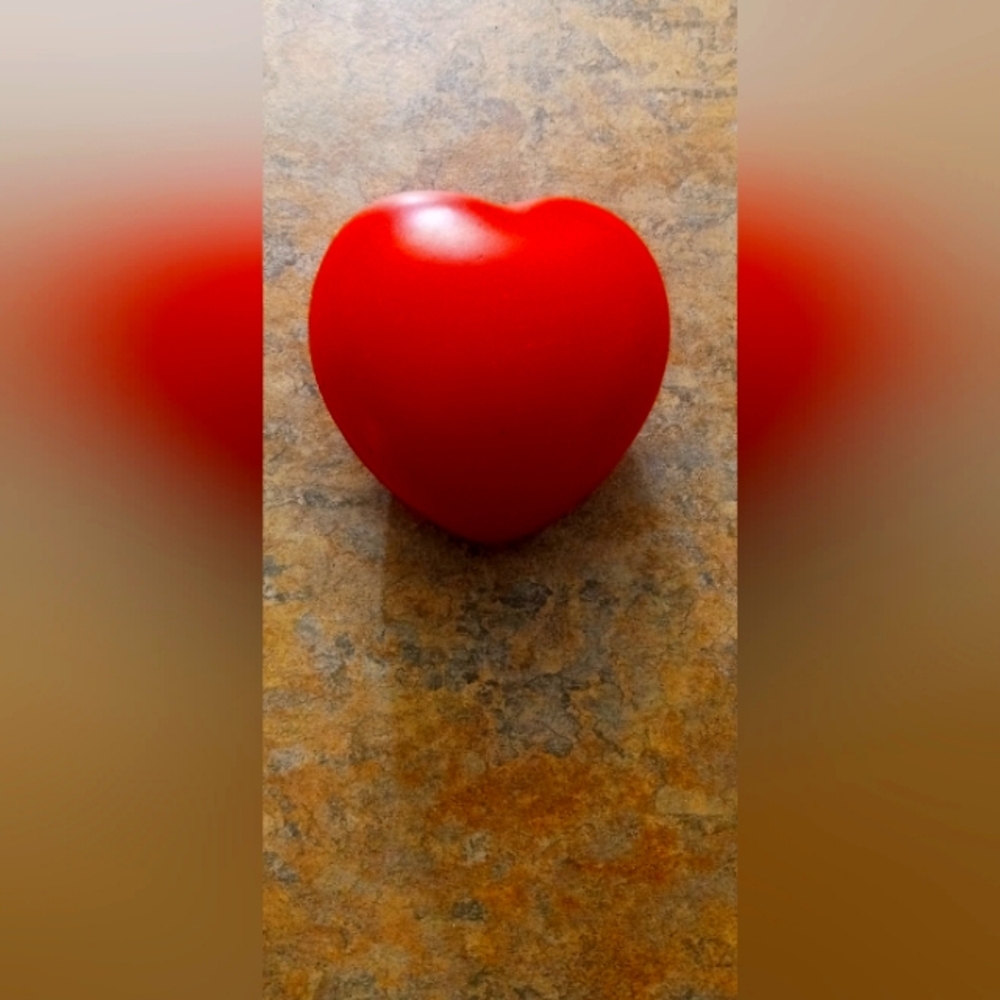 Red Heart anti stress hand squeezer